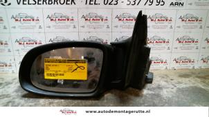 O84460 Gebruikte spiegel buiten links Opel Omega