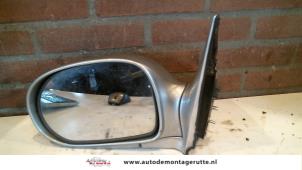 O85035 Gebruikte spiegel buiten links Kia Carnival