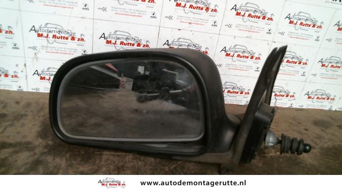Gebruikte Buitenspiegel links Mitsubishi Lancer O85431