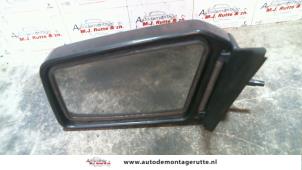 O85730 Gebruikte buitenspiegel links Toyota Starlet