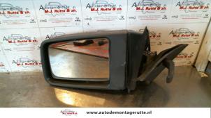 O84474 Gebruikte spiegel buiten links Opel Combo