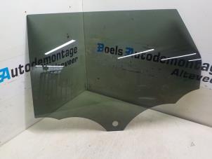 Gebruikte Portierruit 4Deurs links-achter Landrover Range Rover Evoque (LVJ/LVS) 2.2 SD4 16V 5-drs. Prijs € 125,00 Margeregeling aangeboden door Boels Autodemontage