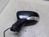 Buitenspiegel links van een Renault Clio IV (5R) 0.9 Energy TCE 90 12V 2013