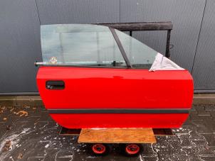 Begagnade Dörr, 2-dörrars, höger Opel Calibra 2.0i Pris € 50,00 Marginaltabell erbjuds av Autobedrijf Hoogerwerf