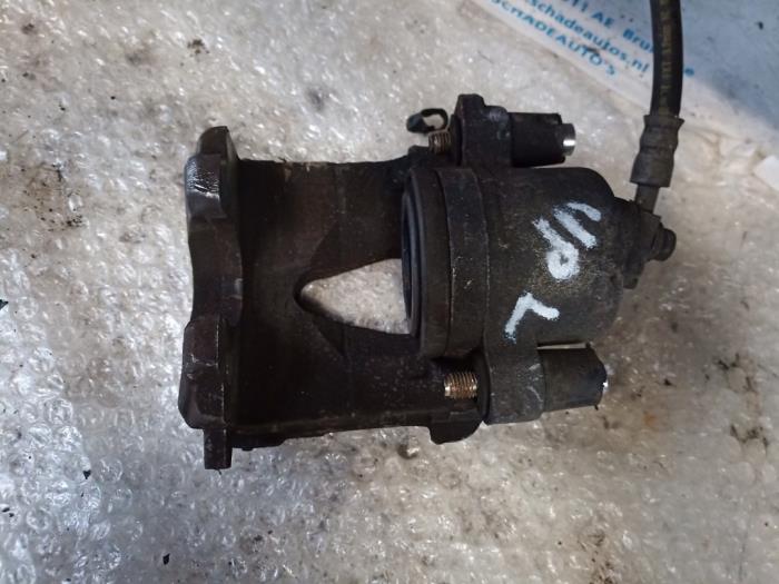 Främre bromsok, vänster från en Volkswagen Up! (121) 1.0 12V 60 2019