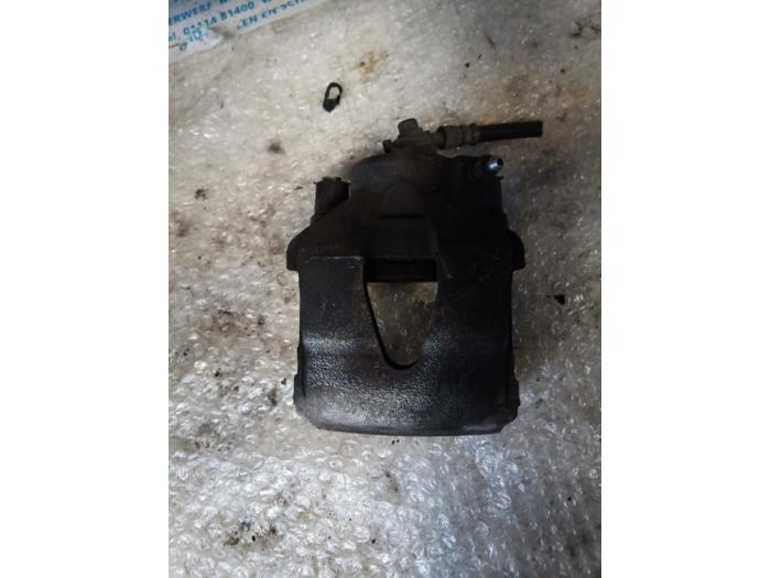 Främre bromsok, vänster från en Volkswagen Up! (121) 1.0 12V 60 2019