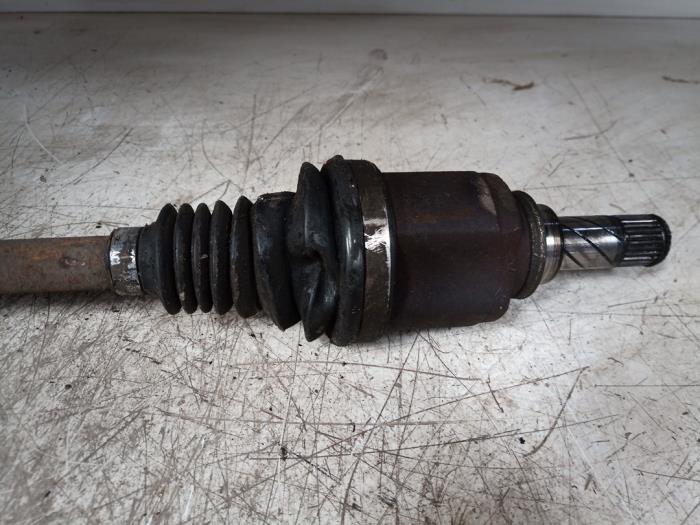 Aandrijfas links-voor van een Renault Kangoo Express (FW) 1.5 dCi 75 2014