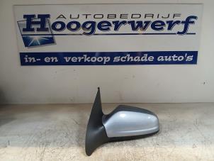 Używane Lusterko zewnetrzne lewe Opel Astra H (L48) 1.4 16V Twinport Cena € 30,00 Procedura marży oferowane przez Autobedrijf Hoogerwerf