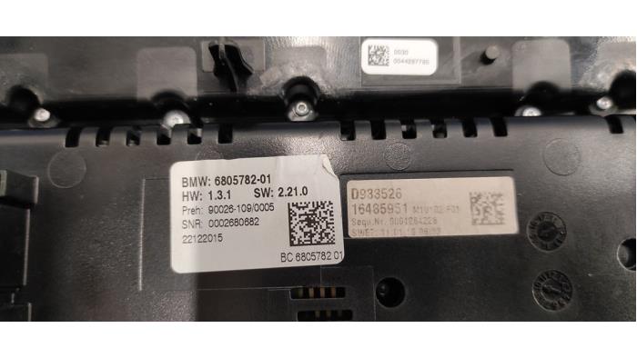 Värmekontrollpanel från en BMW 6 serie (F12) 640i xDrive 24V 2016