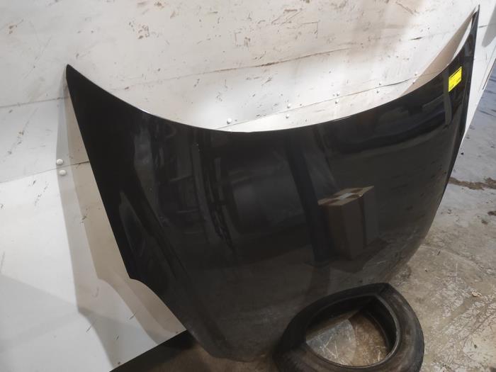 Motorhuv från en Opel Corsa D 1.4 16V Twinport 2008