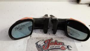 Begagnade Skärmspegel, vänster Opel Calibra Pris på förfrågan erbjuds av Autodemontage Joko B.V.