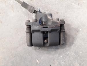 Begagnade Främre bromsok, höger Renault Twingo II (CN) 1.5 dCi 70 Pris på förfrågan erbjuds av Autodemontage Joko B.V.