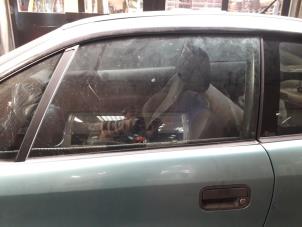 Begagnade Dörrfönster, 2-dörrars, vänster Opel Calibra 2.0i Pris på förfrågan erbjuds av Autodemontage Joko B.V.