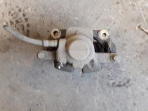 Begagnade Främre bromsok, höger Mini Mini Open (R57) 1.6 Cooper D 16V Pris på förfrågan erbjuds av Autodemontage Joko B.V.