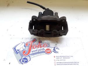 Begagnade Främre bromsok, vänster Seat Leon (1P1) 1.4 TSI 16V Pris på förfrågan erbjuds av Autodemontage Joko B.V.