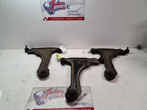 Begagnade Främre undre gaffelben, höger Opel Calibra 2.0i 16V Pris på förfrågan erbjuds av Autodemontage Joko B.V.