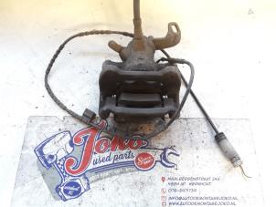 Begagnade Bakre bromsok, höger Mini Mini (R56) 1.6 One D 16V Pris på förfrågan erbjuds av Autodemontage Joko B.V.