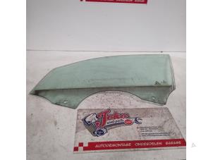 Begagnade Dörrfönster, 4-dörrars, vänster fram BMW 1 serie (F20) 118d 2.0 16V Pris på förfrågan erbjuds av Autodemontage Joko B.V.