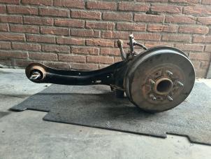 Begagnade Bakre upphängning, vänster Ford Focus 3 1.6 TDCi 95 Pris på förfrågan erbjuds av Autodemontage Joko B.V.