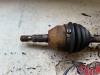 Drivaxel, vänster fram från en Opel Zafira (M75) 2.2 16V Direct Ecotec 2008