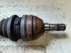 Drivaxel, vänster fram från en Opel Zafira (M75) 2.2 16V Direct Ecotec 2008