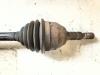 Drivaxel, höger fram från en Opel Zafira (M75) 2.2 16V Direct Ecotec 2008