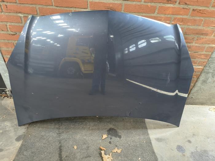 Motorhuv från en Opel Zafira (M75) 2.2 16V Direct Ecotec 2008