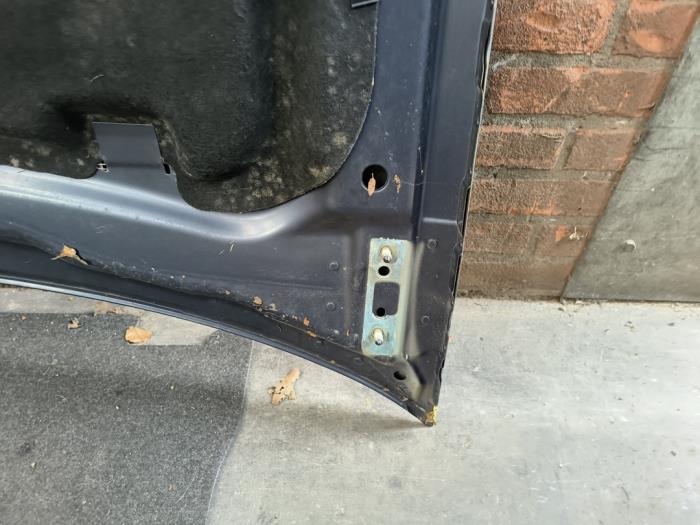 Motorhuv från en Opel Zafira (M75) 2.2 16V Direct Ecotec 2008