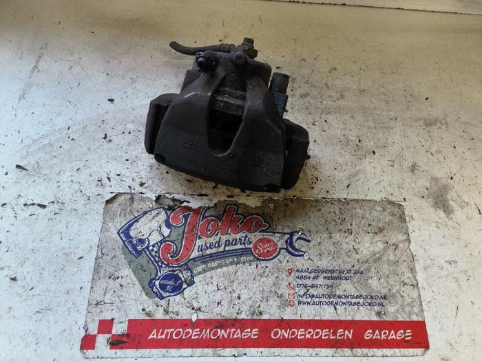 Främre bromsok, höger från en Opel Zafira (M75) 2.2 16V Direct Ecotec 2008