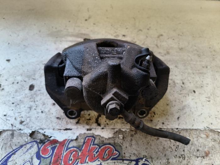 Främre bromsok, höger från en Opel Zafira (M75) 2.2 16V Direct Ecotec 2008