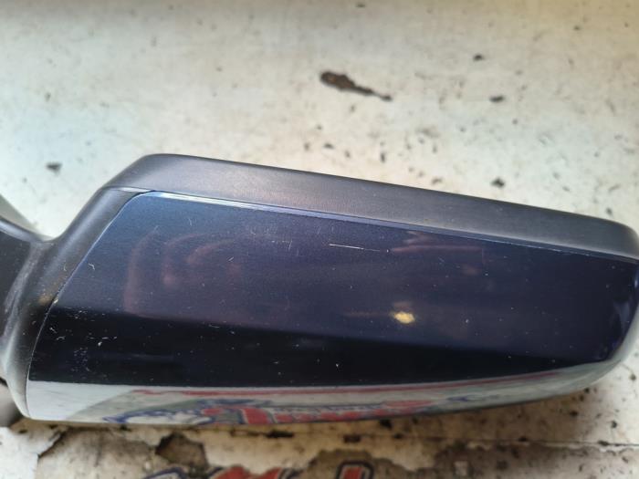 Skärmspegel, vänster från en Opel Zafira (M75) 2.2 16V Direct Ecotec 2008
