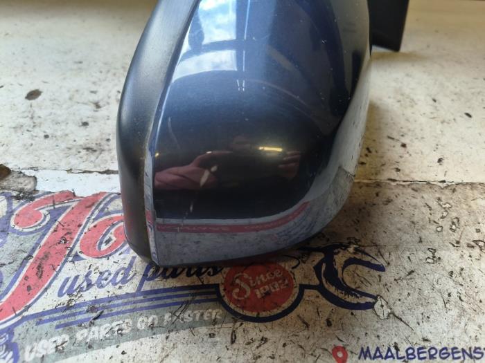 Skärmspegel, vänster från en Opel Zafira (M75) 2.2 16V Direct Ecotec 2008