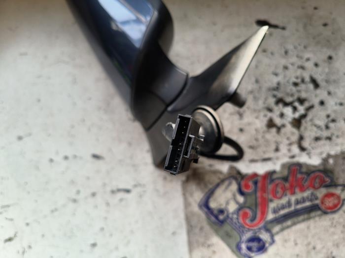 Skärmspegel, höger från en Opel Zafira (M75) 2.2 16V Direct Ecotec 2008