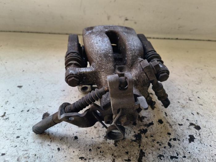 Bakre bromsok, vänster från en Opel Zafira (M75) 2.2 16V Direct Ecotec 2008