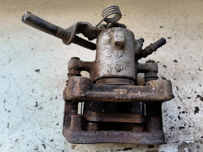 Bakre bromsok, vänster från en Opel Zafira (M75) 2.2 16V Direct Ecotec 2008