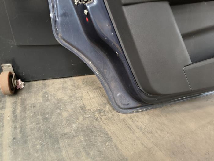 Bakdörr, 4-dörrars, vänster från en Opel Zafira (M75) 2.2 16V Direct Ecotec 2008