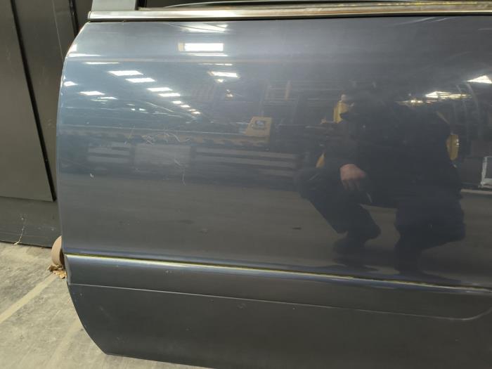 Bakdörr, 4-dörrars, vänster från en Opel Zafira (M75) 2.2 16V Direct Ecotec 2008