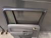 Bakdörr, 4-dörrars, vänster från en Opel Zafira (M75) 2.2 16V Direct Ecotec 2008
