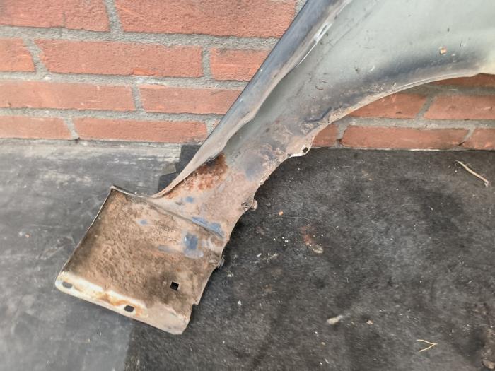 Framskärm, vänster från en Mazda 2 (NB/NC/ND/NE) 1.4 16V 2006