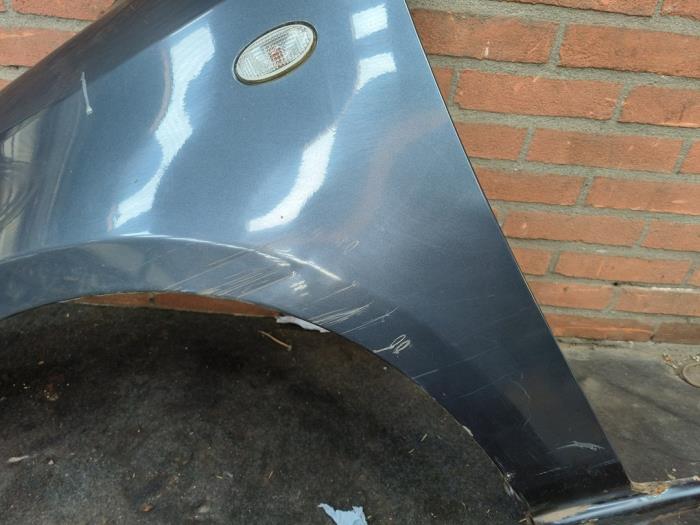 Framskärm, vänster från en Mazda 2 (NB/NC/ND/NE) 1.4 16V 2006