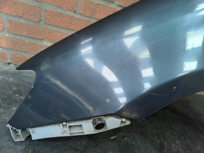 Framskärm, vänster från en Mazda 2 (NB/NC/ND/NE) 1.4 16V 2006