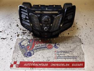 Begagnade Radiokontrollpanel Ford Fiesta 6 (JA8) 1.0 SCI 12V 80 Pris på förfrågan erbjuds av Autodemontage Joko B.V.