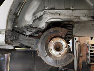 Begagnade Bakre upphängning, vänster Ford Focus 3 Wagon 1.6 TDCi ECOnetic Pris på förfrågan erbjuds av Autodemontage Joko B.V.