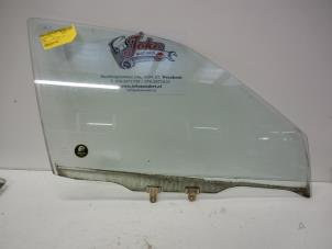 Begagnade Dörrfönster, 4-dörrars, höger fram Nissan Almera (N15) 1.4 LX,GX,S 16V Pris på förfrågan erbjuds av Autodemontage Joko B.V.