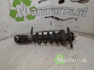 Gebruikte Veerpoot links-achter Mini Mini (R56) 1.6 16V One Prijs € 28,80 Margeregeling aangeboden door Autodemontagebedrijf De Mars