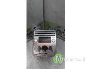 Używane Odtwarzacz CD Mazda 5 (CR19) 1.8i 16V Cena € 54,00 Procedura marży oferowane przez Autodemontagebedrijf De Mars