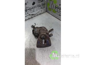 Używane Zacisk hamulcowy prawy tyl Mercedes B (W246) 1.6 B-180 BlueEFFICIENCY Turbo 16V Cena € 44,00 Procedura marży oferowane przez Autodemontagebedrijf De Mars