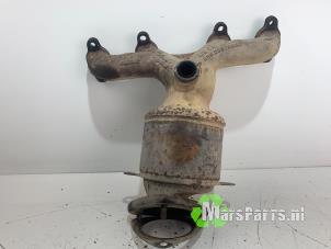 Używane Kolektor wydechowy + katalizator Volkswagen Caddy III (2KA,2KH,2CA,2CH) 2.0 SDI Cena € 150,00 Procedura marży oferowane przez Autodemontagebedrijf De Mars