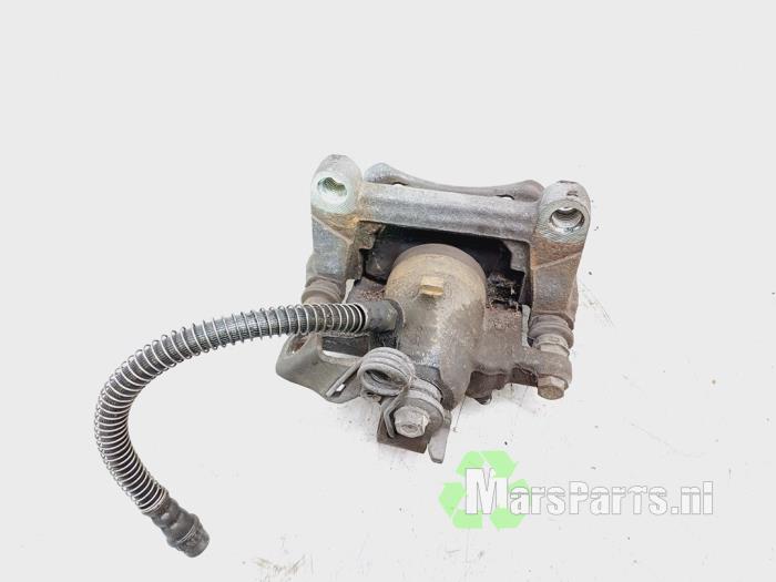 Zacisk hamulcowy prawy tyl z Opel Vivaro 1.6 CDTI 90 2016