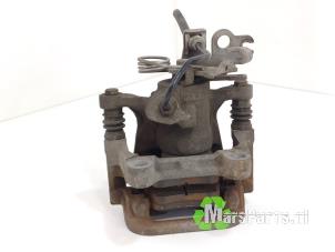 Używane Zacisk hamulcowy prawy tyl Volkswagen Caddy IV 1.4 TSI 16V Cena € 50,00 Procedura marży oferowane przez Autodemontagebedrijf De Mars